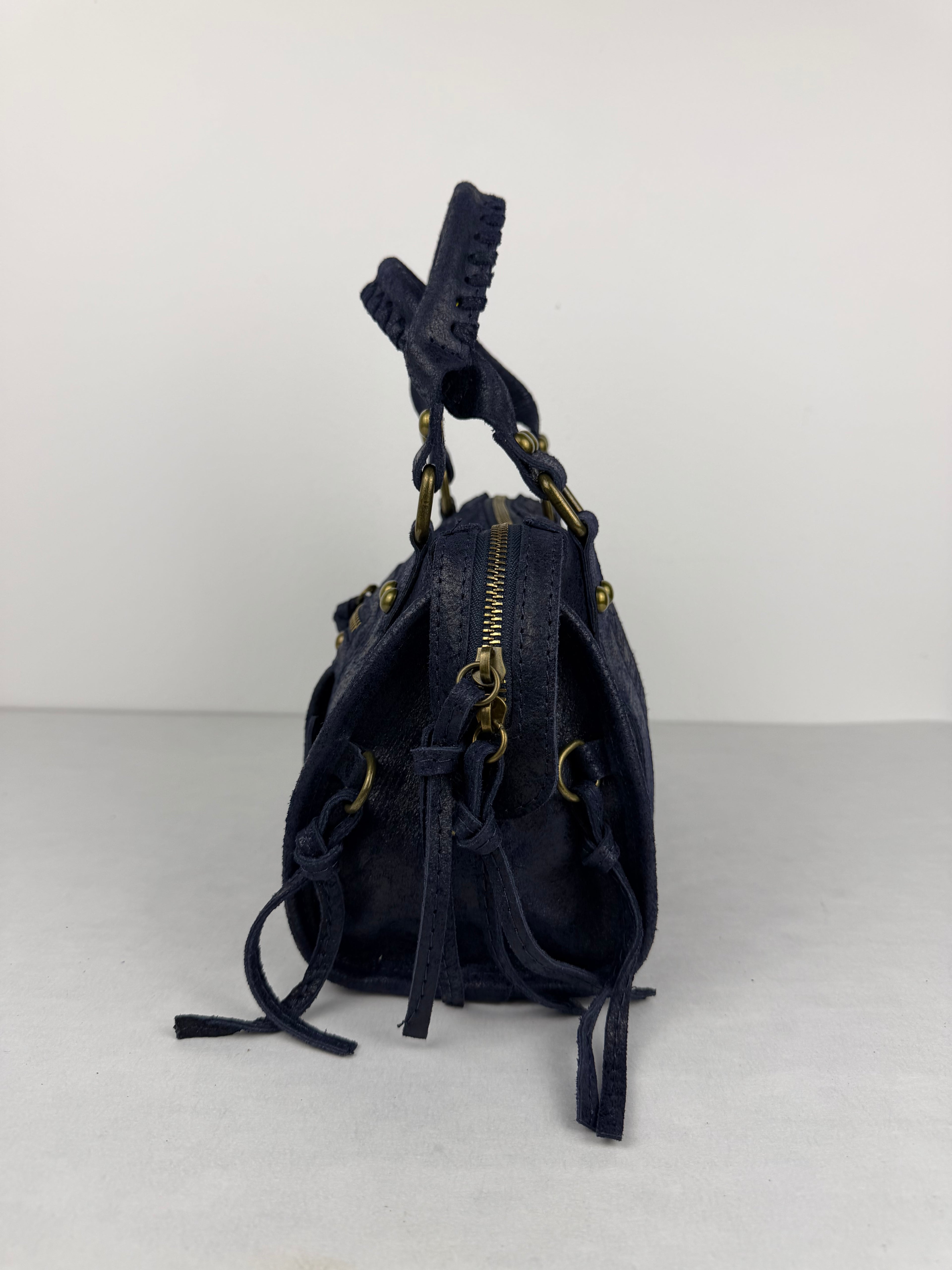 Metropolis mini vera pelle